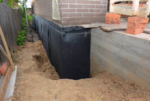 Happy homeowners after waterproofing job in Kalamazoo